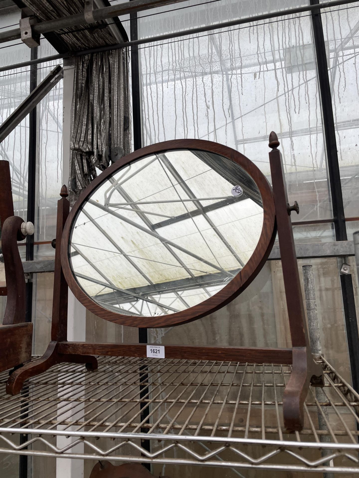 AN OAK SWING FRAME DRESSING TABLE MIRROR