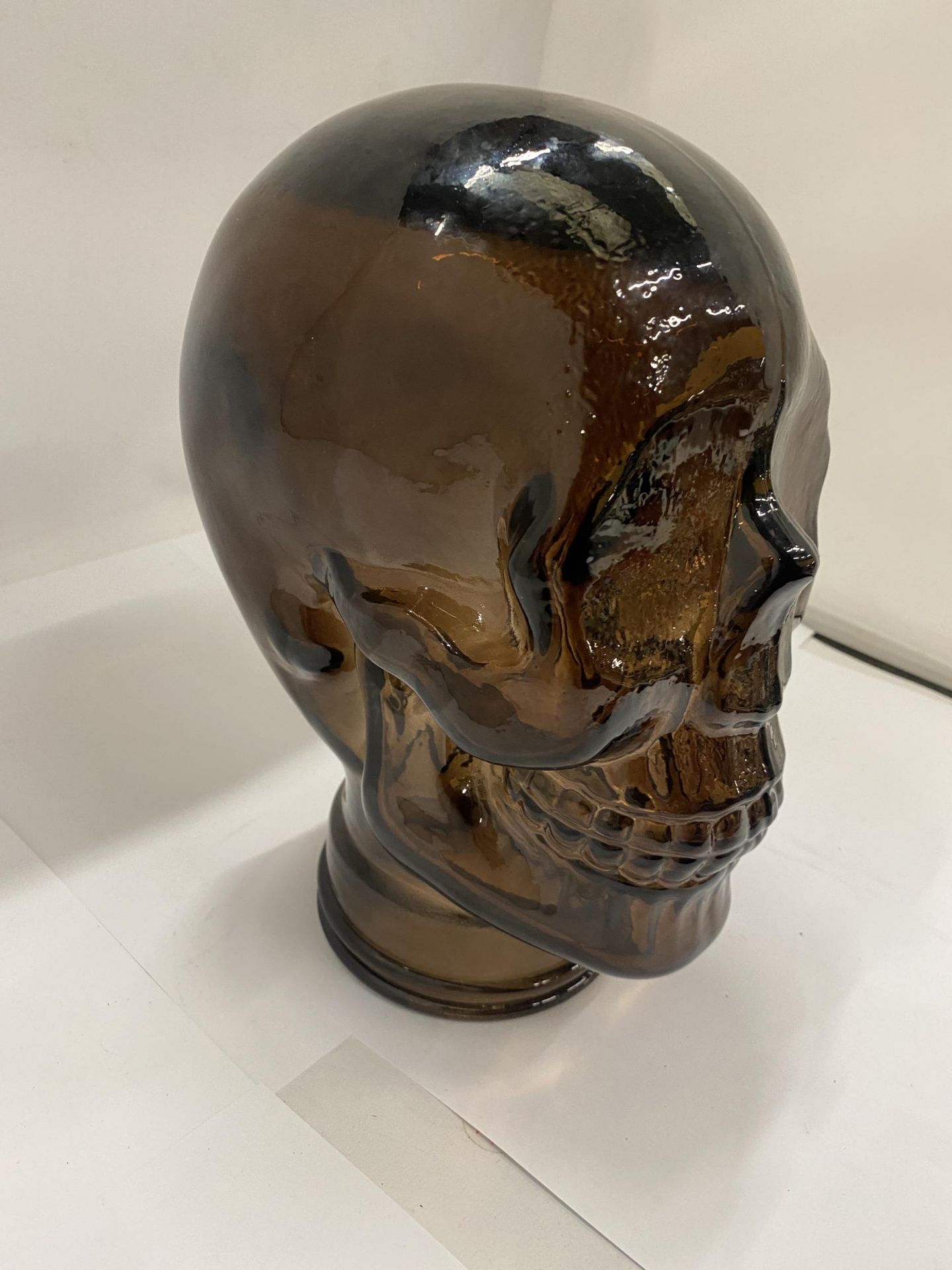 A LARGE DOUBLE THICKNESS COLOURED GLASS SKULL, HEIGHT 26CM