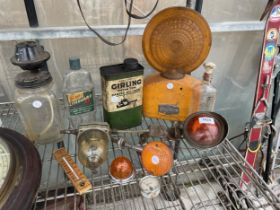 AN ASSORTMENT OF VINTAGE AUTOMOBILE ITEMS TO INCLUDE LIGHTS, AN OIL CAN AND A FUEL PUMP ETC