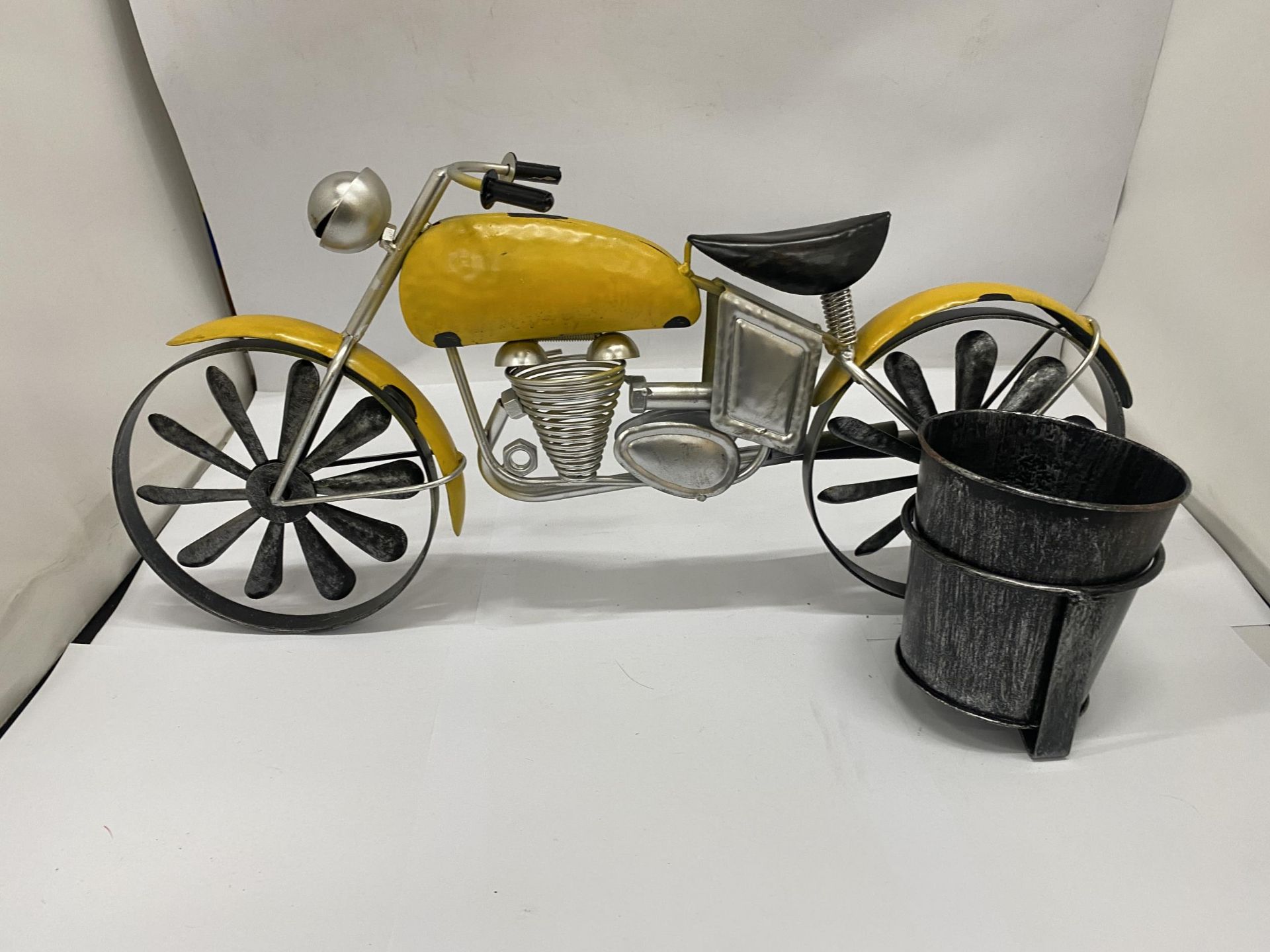 A LARGE TIN PLATE MOTOR BIKE PLANTER, HEIGHT 23CM, LENGTH 50CM