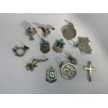 TWELVE ASSORTED SILVER CHARMS