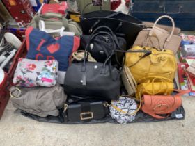 AN ASSORTMENT OF VARIOUS LADIES HANDBAGS