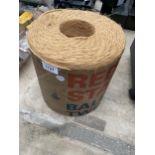 A ROLL OF RED STAR HESIAN BALER TWINE