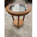 A RETRO TEAK TWO TIER 19.5" DIAMETER OCCASIONAL TABLE WITH INSET GLASS TOP AND STARBURST LOWER TIER
