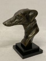 A BRONZE BUST OF A GREYHOUND ON A MARBLE BASE