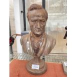 A VINTAGE CAST IRON BUST OF A MALE