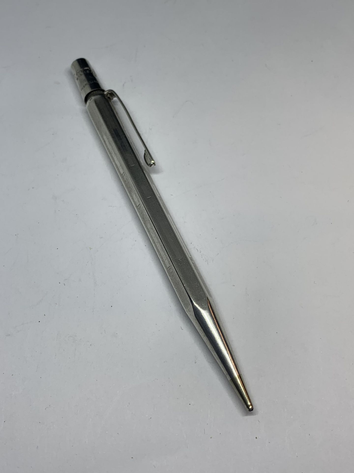 A SILVER YARD OF LEAD PENCIL