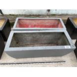 A PAIR OF LOW FIBRE GLASS TROUGH PLANTERS (L:50CM)