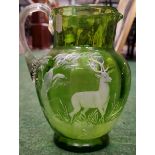 A VINTAGE MARY GREGORY GREEN JUG WITH STAG DESIGN, HEIGHT 18 CM