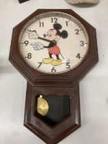 A VINTAGE MICKEY MOUSE PLASTIC CASED WALL CLOCK, 'WELBY BY ELGIN'