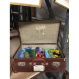 A VINTAGE SUITCASE OF ASSORTED VEHICLES, MINI FOOTBALL GAMES ETC