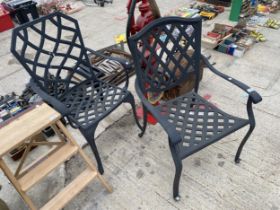 A NEAR PAIR OF CAST ALLOY CARVER CHAIRS