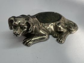 A WHITE METAL DOG PIN CUSHION