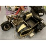 A TIN PLATE METAL MOTORCYCLE AND SIDE CAR MODEL