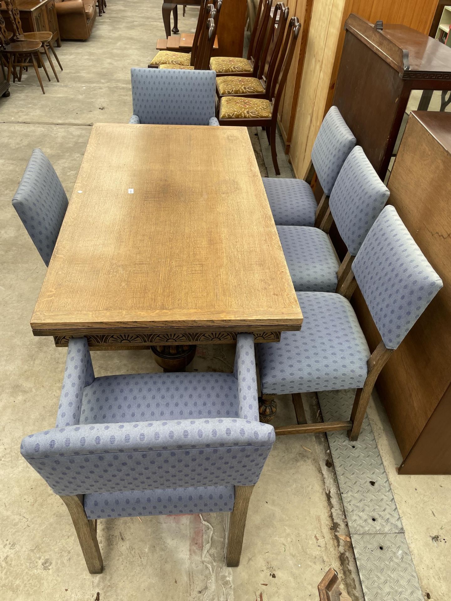 AN EARLY 20TH CENTURY OAK TWIN-PEDESTAL DRAW-LEAF DINING TABLE AND SIX CHAIRS, TWO BEING CARVERS, 60 - Image 9 of 9