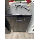 A BLACK SWAN SLIMLINE DISHWASHER