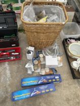 AN ASSORTMENT OF ITEMS TO INCLUDE A WICKER BASKET, CLOTHES HANGERS AND FURNITURE CASTORS ETC