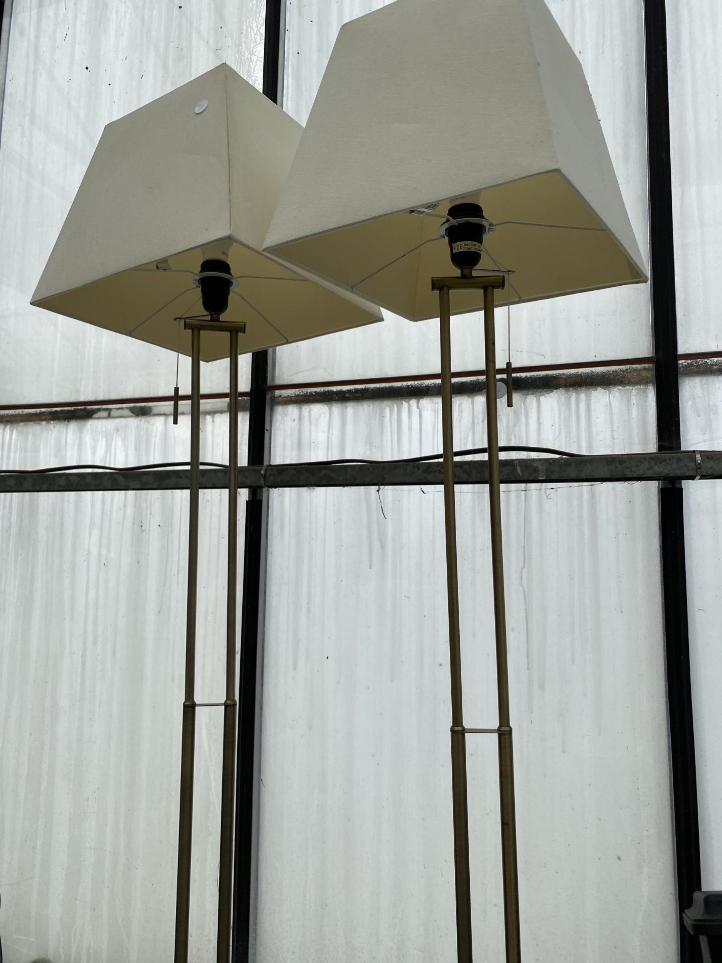 A PAIR OF DECORATIVE METAL STANDARD LAMPS WITH SHADES - Image 2 of 3