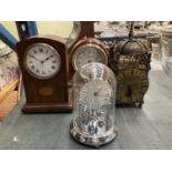 A VINTAGE BRASS LANTERN CLOCK, A CARRIAGE CLOCK AND TWO WOODEN MANTLE CLOCKS