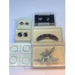 SEVEN VARIOUS AS NEW AND BOXED EARRINGS AND BROOCHES TO INCLUDE SILVER