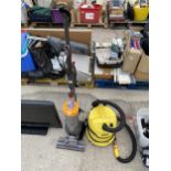 A DYSON VACUUM CLEANER BELIEVED IN WORKING ORDER BUT NO WARRANTY AND A FURTHER KARCHER VACUUM