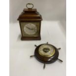 A HEAVY GARRARD AND CO MANTLE CLOCK PLUS A SMALL 'SHIP'S WHEEL' BAROMETER