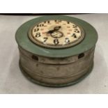 A TIN PLATE 'CLOCK' MONEY BOX