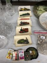 A COLLECTION OF VINTAGE TRAIN COLOUR POSTCARDS, BROOKE BOND TEA CARDS AND A WHITE METAL MATCH BOX
