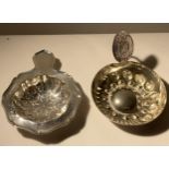 TWO ITEMS - A 1947 HALLMARKED BIRMINGHAM TEA STRAINER AND A WINE CUP MARKED WITH SAINT VINCENT