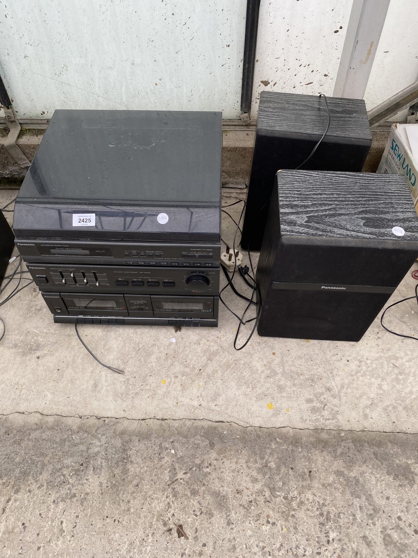 A PANASONIC STEREO SYSTEM AND A PAIR OF SPEAKERS