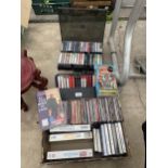 AN ASSORTMENT OF CASSETTES, CDS AND VHS VIDEOS