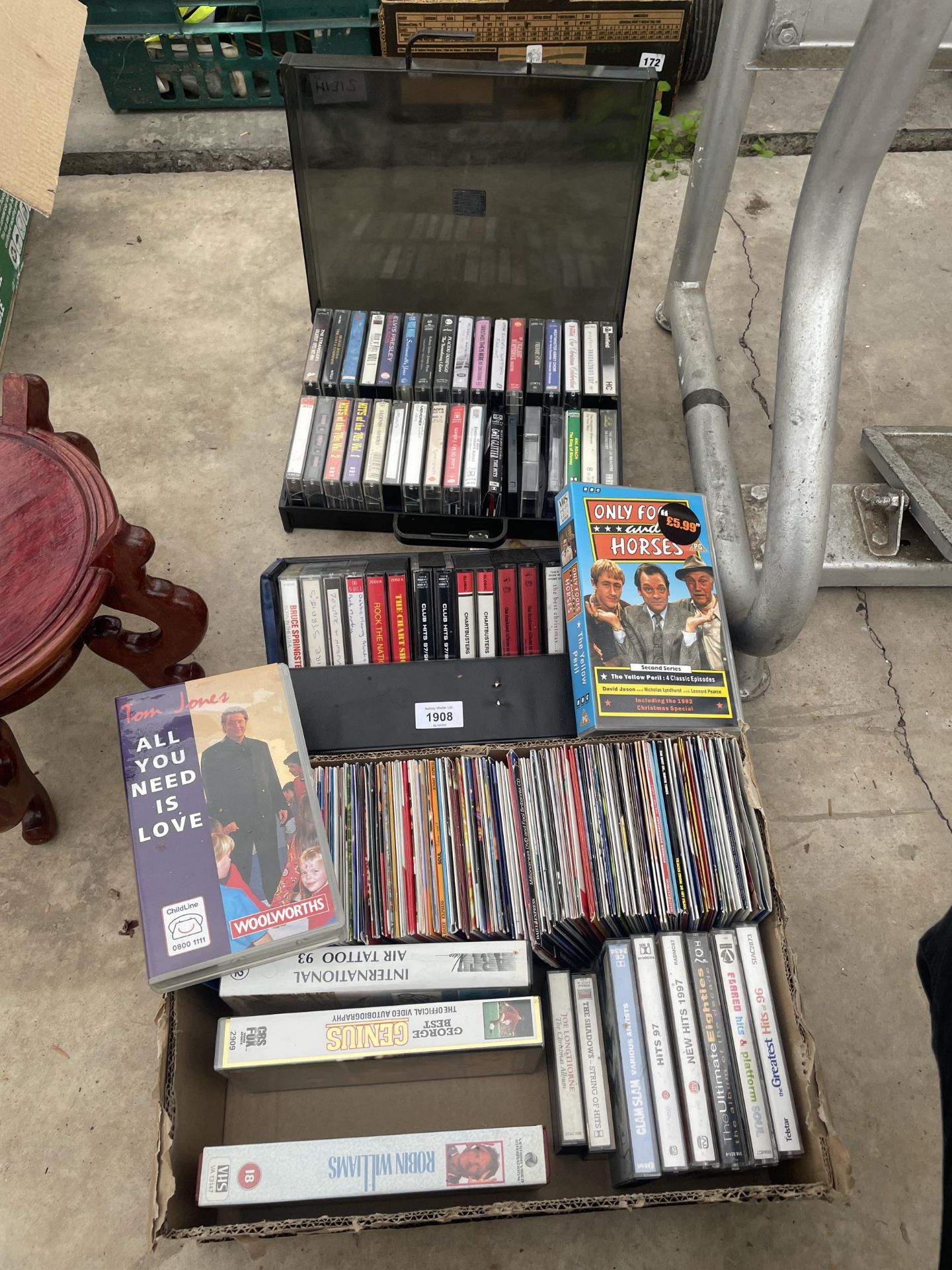 AN ASSORTMENT OF CASSETTES, CDS AND VHS VIDEOS