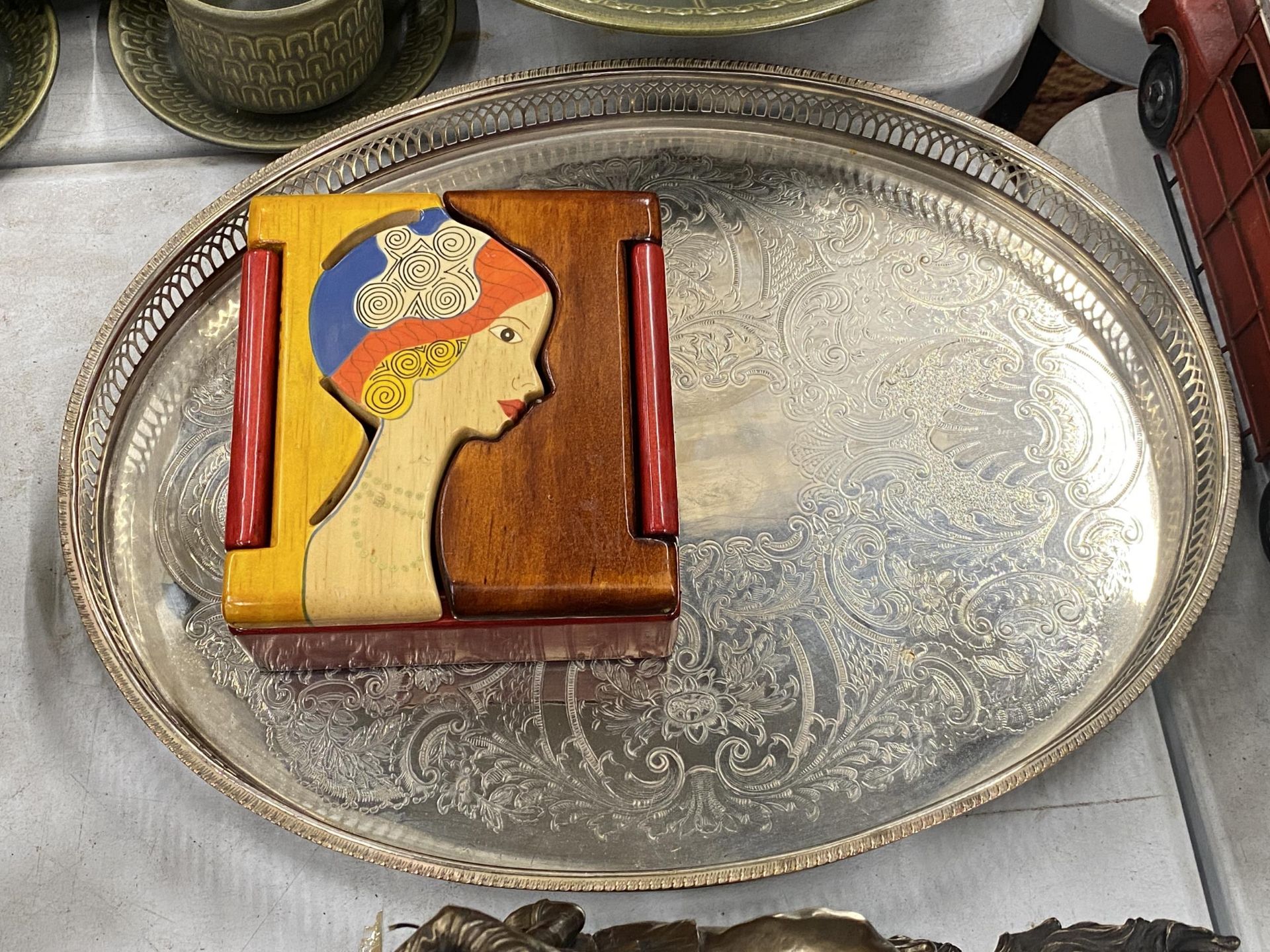 AN OVAL SILVER PLATED GALLERIED TRAY AND A COLUMBIAN HAND PAINTED BOX