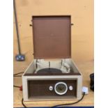A KB RADIO TUNETIME VINTAGE RECORD PLAYER IN A CASE