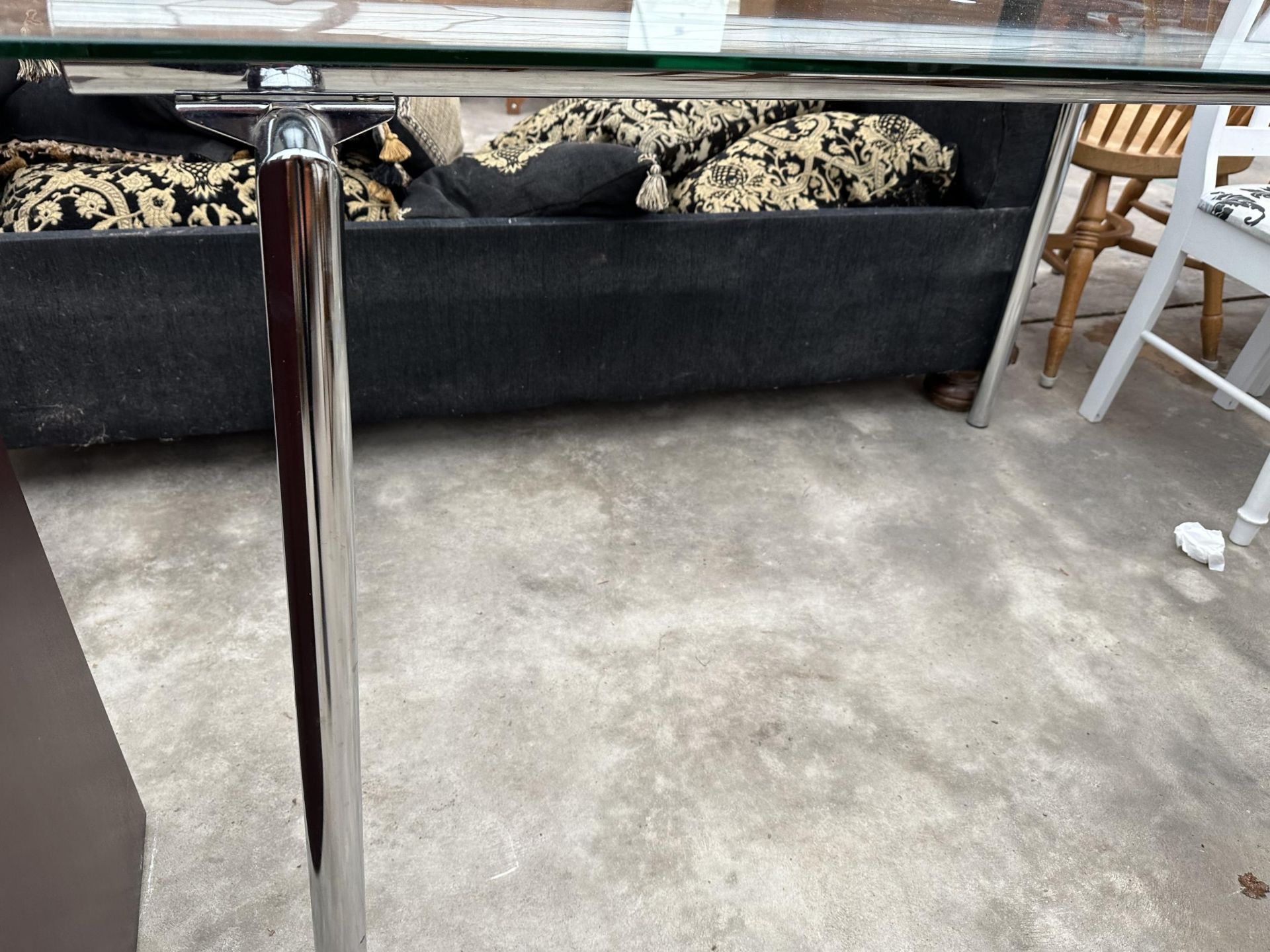 A RETRO DINING TABLE WITH GLASS TOP ON TUBULAR POLISHED CHROME BASE, 55 X 31.5" - Image 3 of 3