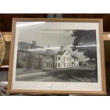 A FRAMED BLACK AND WHITE PHOTO OF AN OLD RAC BUILDING