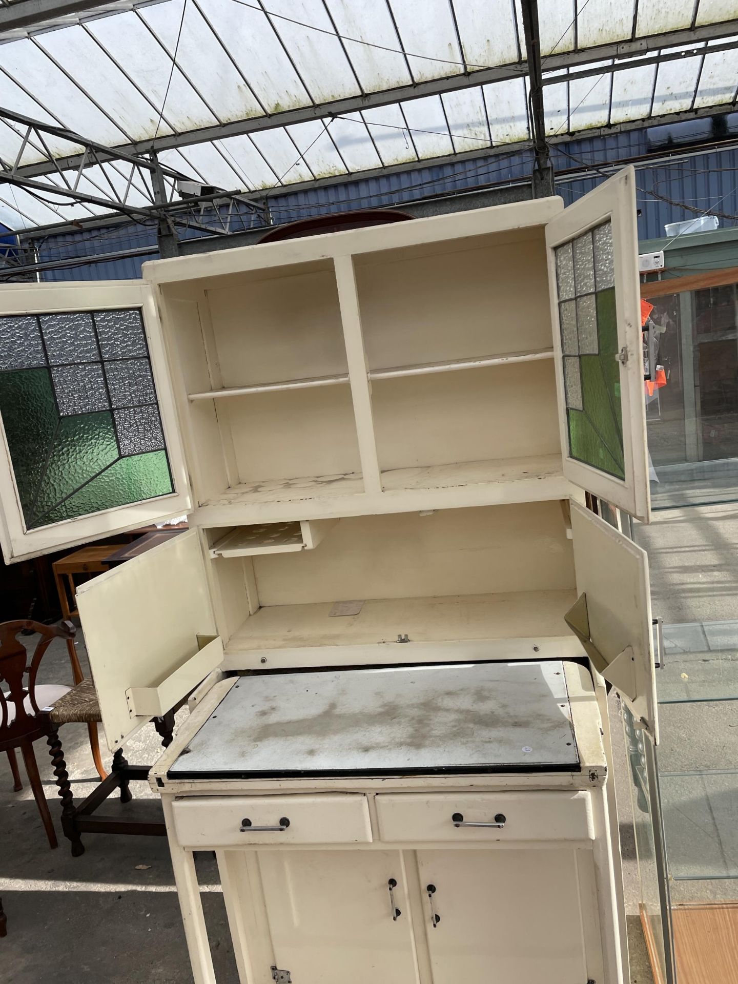 A 1950'S METALWARE KITCHEN CABINET WITH PULL-OUT ENAMEL WORK SURFACE, ON LEGS WITH CASTERS, WITH - Image 4 of 5