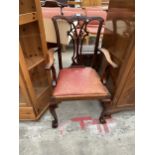 A MAHOGANY CHIPPENDALE STYLE CARVER CHAIR WITH PIERCED SPLAT BACK, ON FRONT CABRIOLE LEGS WITH