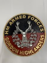 A CAST GORDON HIGHLANDER SIGN