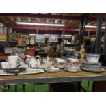 A LARGE QUANTITY OF CERAMIC ITEMS TO INCLUDE BLUE AND WHITE PLATES AND BOWLS,CHINA TRIOS, A