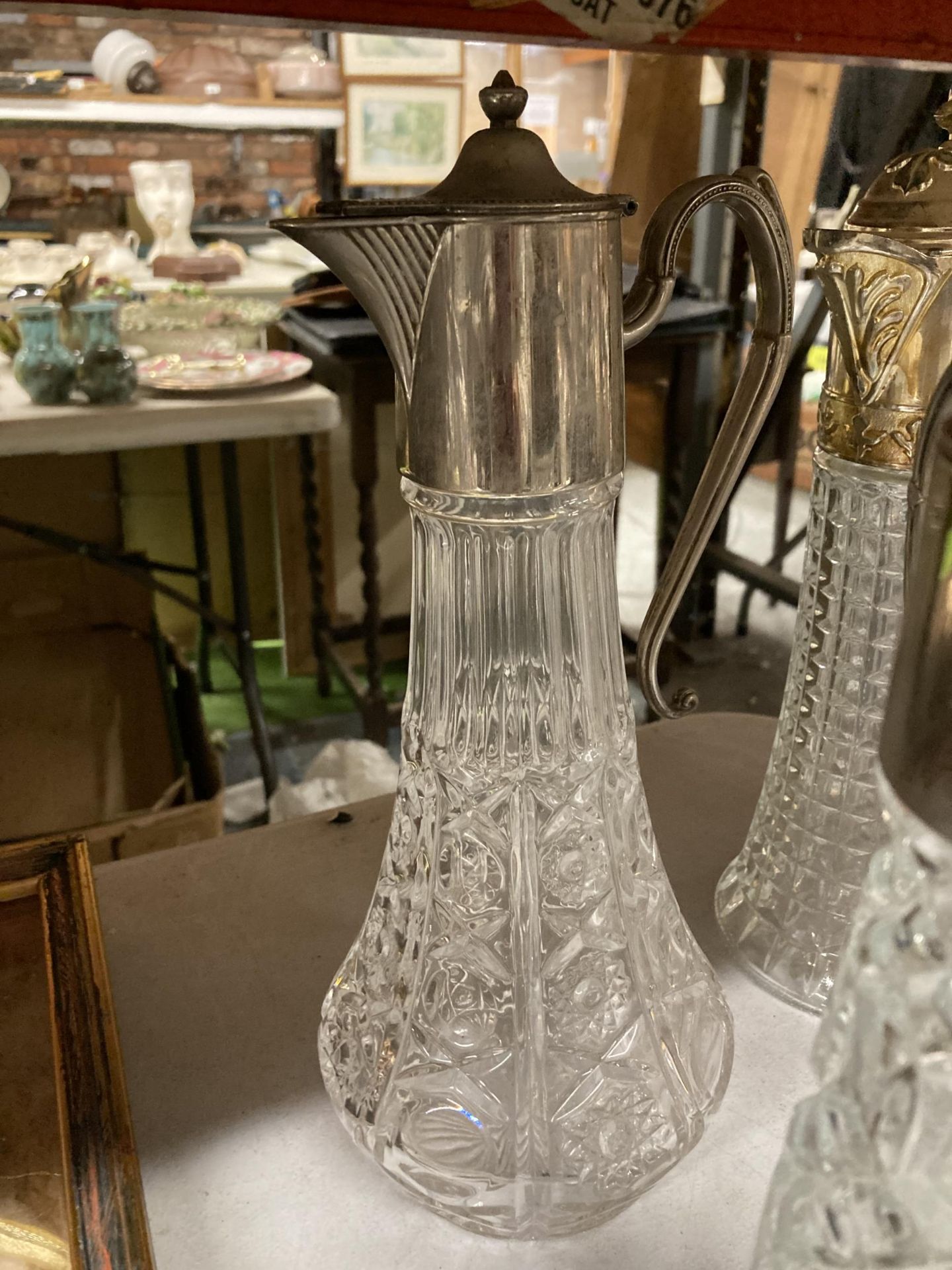 A GROUP OF FOUR SILVER PLATED AND CUT GLASS CLARET JUGS AND TWO FURTHER DECANTERS - Image 3 of 5