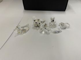 A COLLECTION OF SWAROVSKI AND CRYSTAL SMALL ORNAMENTS TO INCLUDE A DUCK, PENGUIN, TEDDY, RABBIT