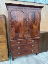 A 19TH CENTURY MAHOGANY PRESS ENCLOSING FOUR SLIDES AND TWO SHORT AND TWO LONG DRAWERS TO THE