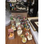 A COLLECTION OF DISNEY ITEMS, BOXED MICKEY MOUSE BLACK AND WHITE PLANE, SNOW GLOBES ETC