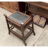 AN EDWARDIAN PIANO STOOL WITH MULTIPLE TURNINGS AND LIFT-UP SEAT