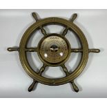 A VINTAGE BRASS BAROSTAR SHIPS WHEEL BAROMETER, DIAMETER 32 CM