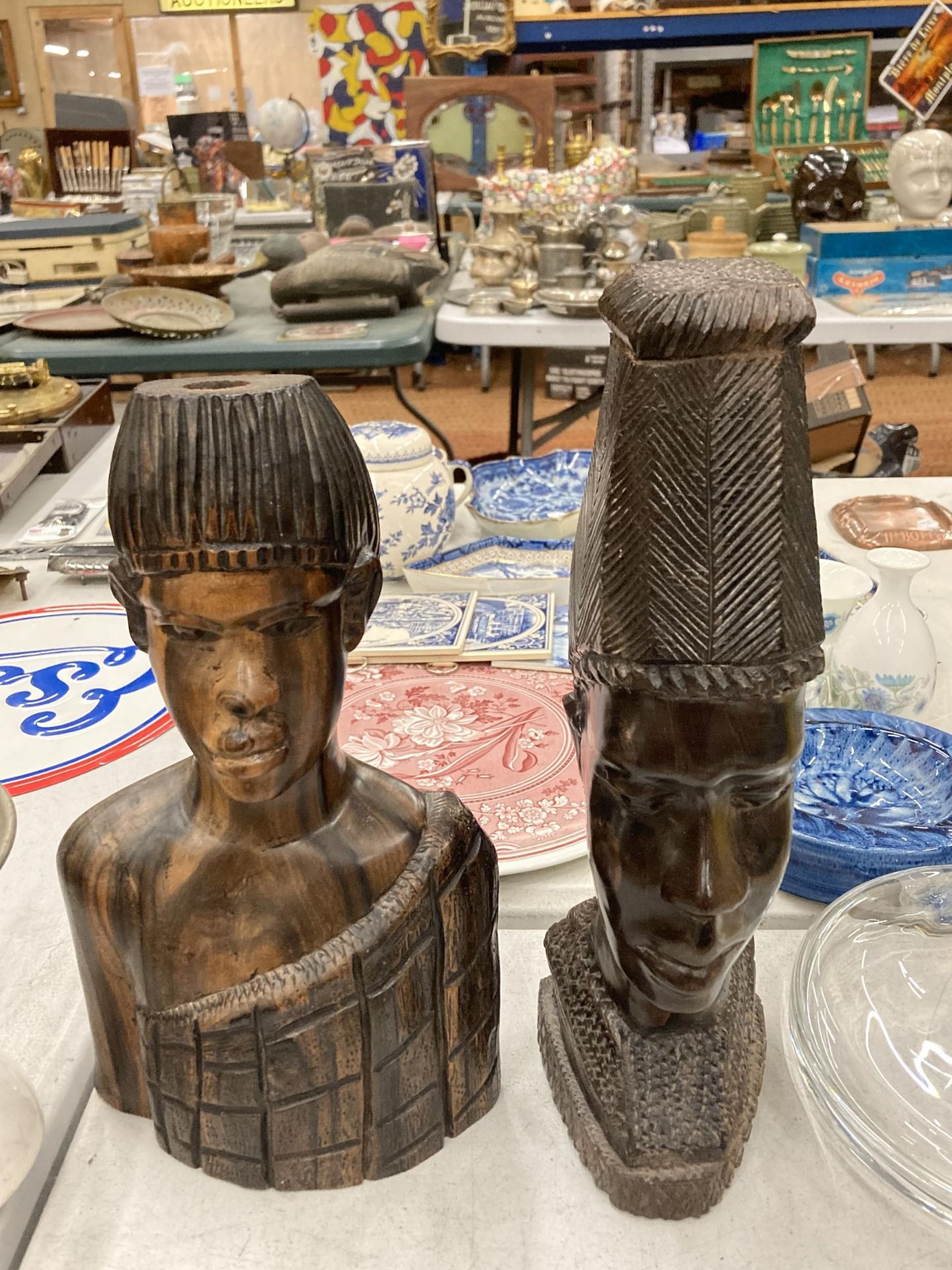 A PAIR OF AFRICAN TRIBAL WOODEN BUSTS
