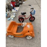 A VINTAGE PEDAL CAR AND A VINTAGE CHILDS TRIKE