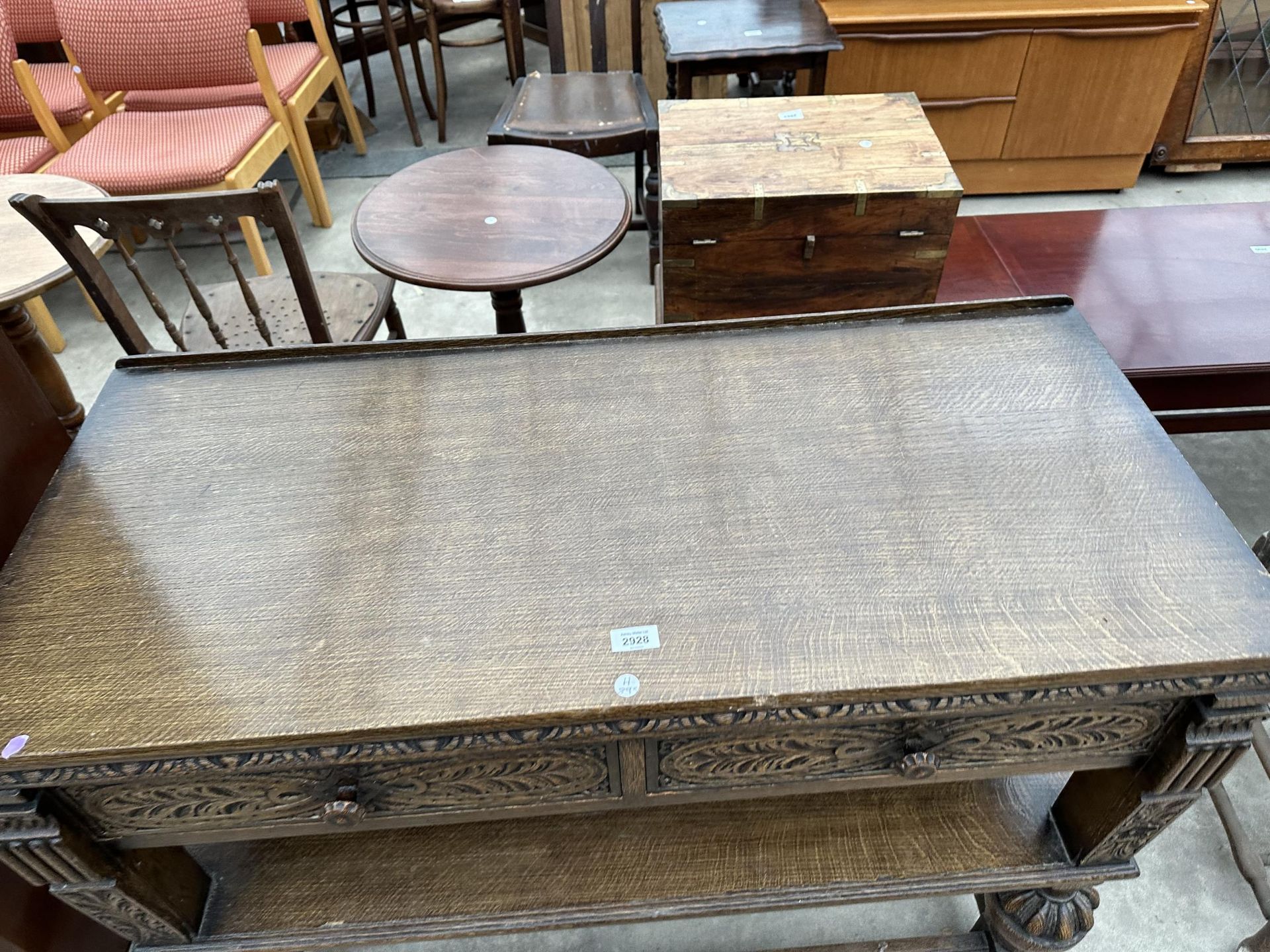 A JACOBEAN STYLE OAK BERICK FURNITURE SIDE-TABLE ENCLOSING TWO DRAWERS ON OPEN BASE WITH POT - Image 2 of 4