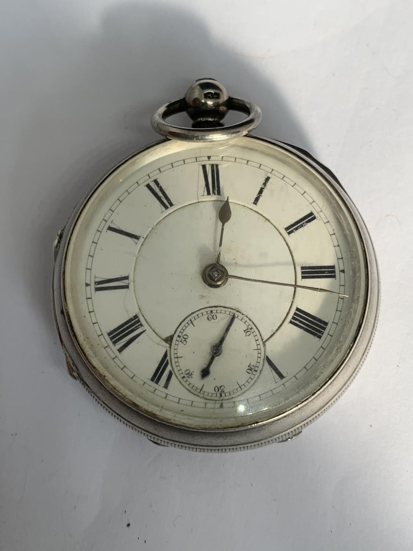 A SILVER POCKET WATCH